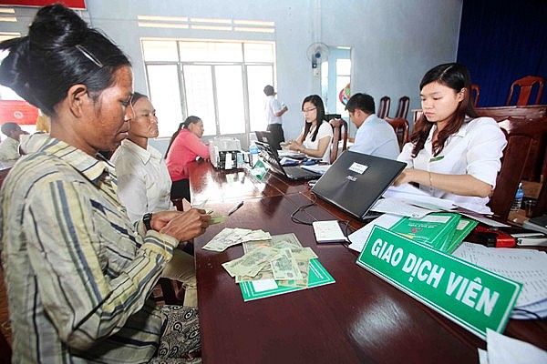iểm giao dịch của NHCSXH tại xã là địa chỉ quen thuộc của người nghèo và các đối tượng chính sách trên địa bàn tỉnh Gia Lai. Nguồn: VBSP.